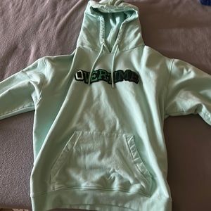 Teal/green overtime hoodies
